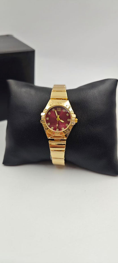 DIŞI ALTIN İÇİ KIRMIZI YUVARLAK BAYAN SAAT