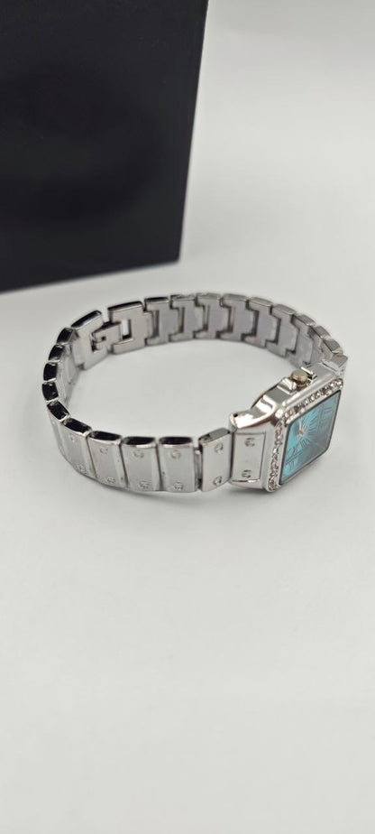 DIŞI GÜMÜŞ İÇİ TURKUAZ KARE BAYAN SAAT