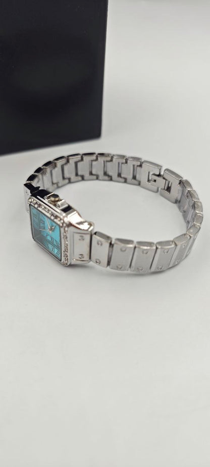 DIŞI GÜMÜŞ İÇİ TURKUAZ KARE BAYAN SAAT