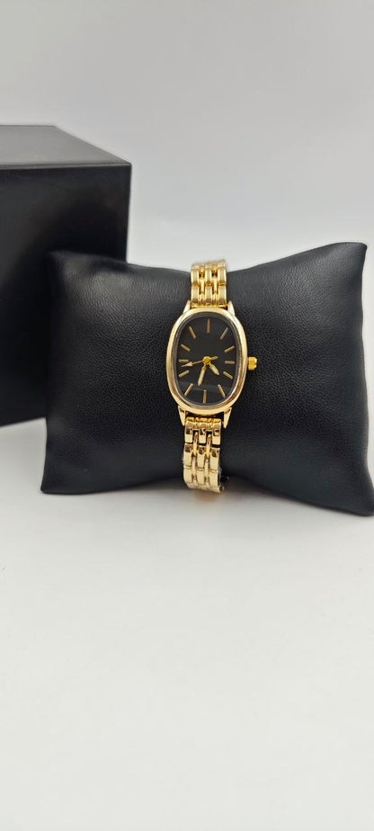 DIŞI GOLD İÇİ SİYAH BAYAN SAAT