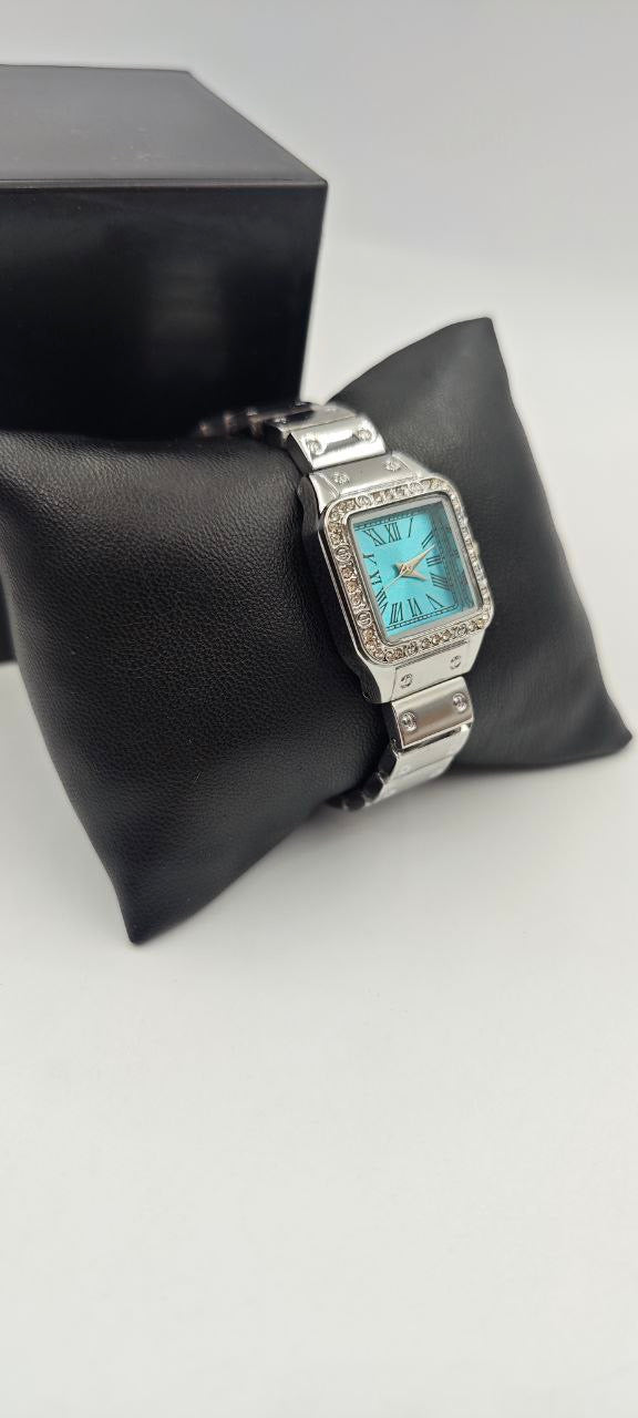 DIŞI GÜMÜŞ İÇİ TURKUAZ KARE BAYAN SAAT