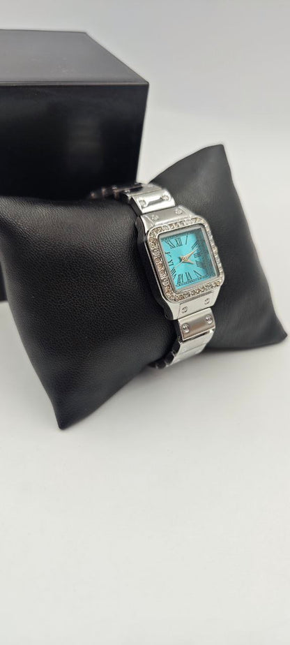 DIŞI GÜMÜŞ İÇİ TURKUAZ KARE BAYAN SAAT