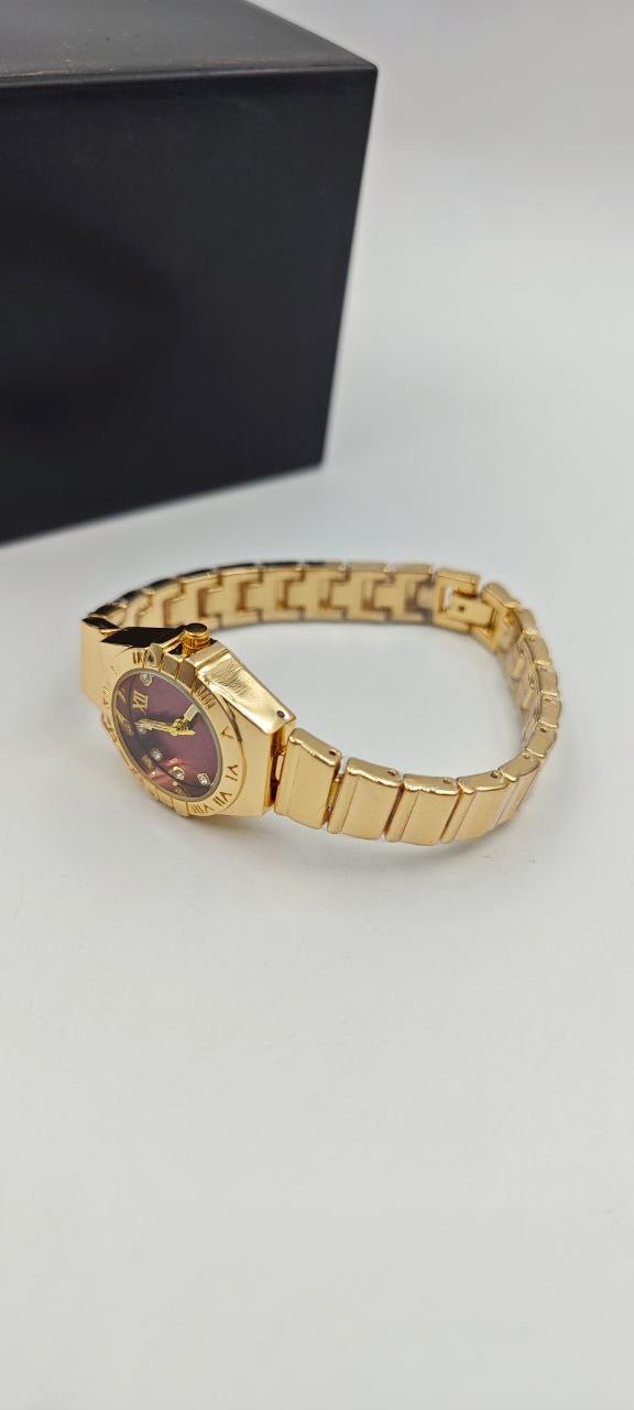 DIŞI ALTIN İÇİ KIRMIZI YUVARLAK BAYAN SAAT